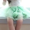 Green net toddler skirt with floral bow for wedding
