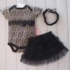 Black baby girl bodysuit with matching headband, stylish for special occasions