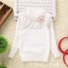 White winter sweater for young girls, cozy and stylish