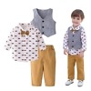 Kids party outfit with waistcoat, shirt, and pants, stylish wedding or birthday wear