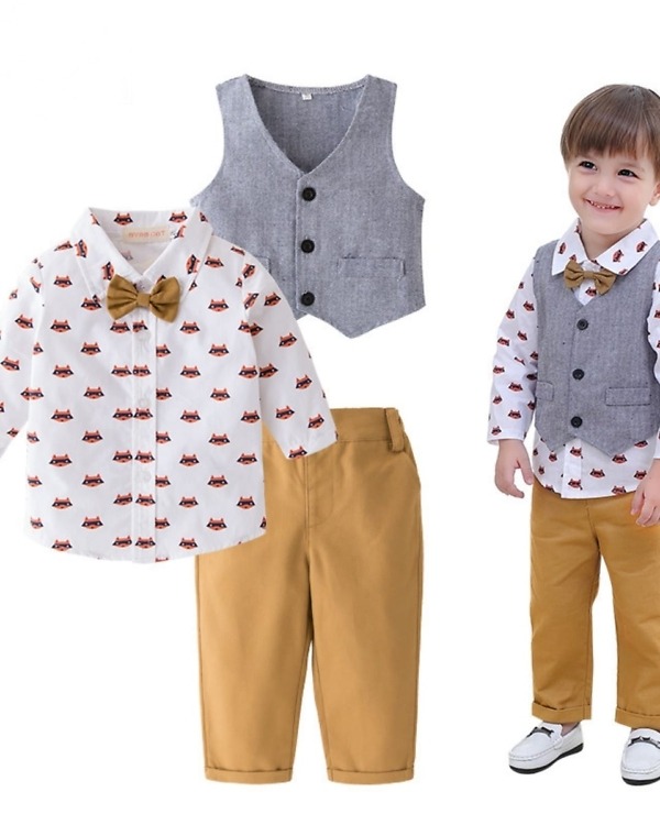 Kids party outfit with waistcoat, shirt, and pants, stylish wedding or birthday wear