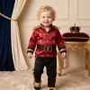 Baby king costume for toddler kids, a regal first birthday party outfit with cinematic royal styling