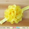 Bright yellow infant hairband for cheerful birthday celebrations