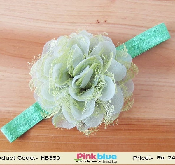 Green baby girl headband with flower for festive family events