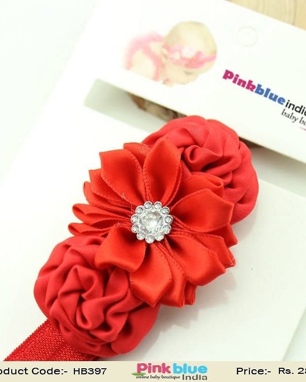Ravishing red toddler hairband with satin flowers for parties