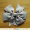Grey double knot bow hair accessory for baby party outfit, modern stylish look