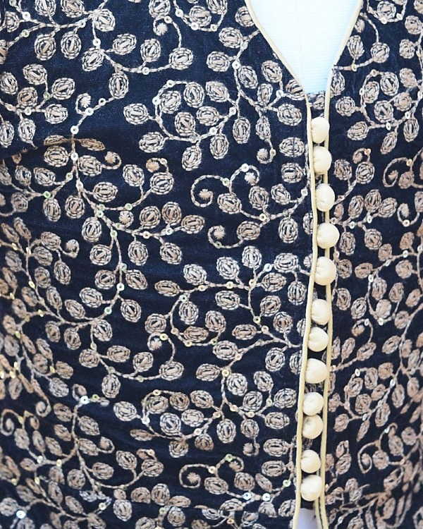 Ethnic black velvet jacket with champagne skirt, elegant party wear