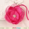 Magenta pink flower hair accessory for kids festive wear, bright stylish look