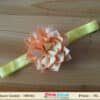 Neon green and salmon floral hair accessory for kids festive wear, bright stylish look