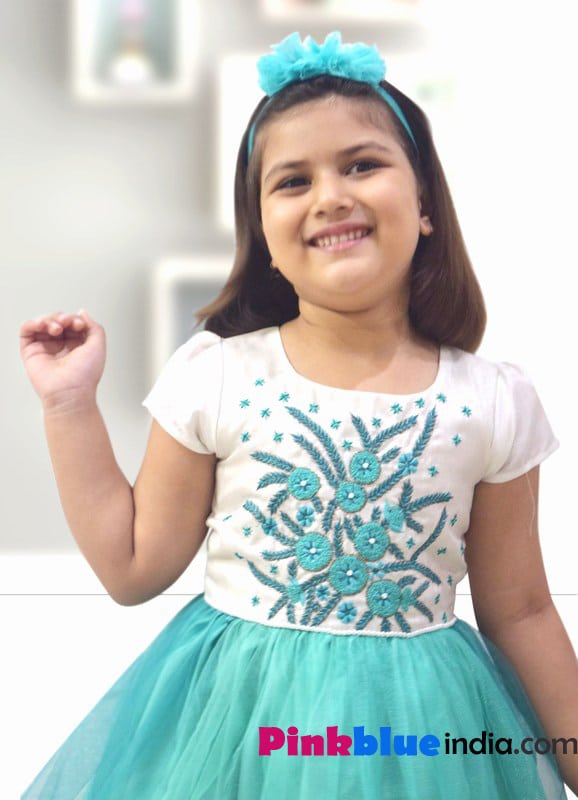 Elegant baby girl party dress soft tones festive occasion stylish look
