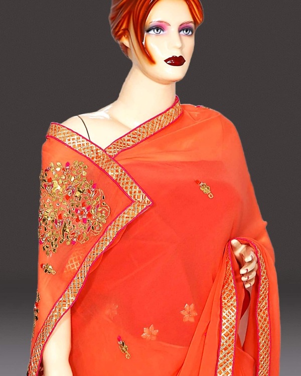 Women peach georgette saree festive occasion wear elegant flowing design