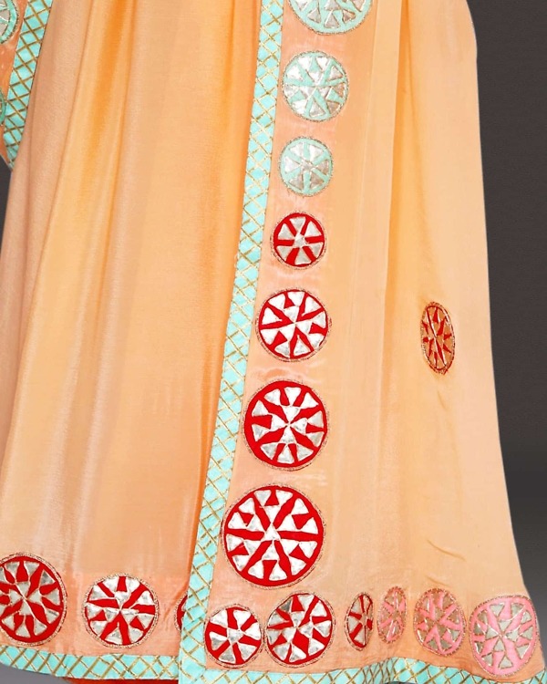 Women peach wedding saree Indian occasion wear elegant graceful look
