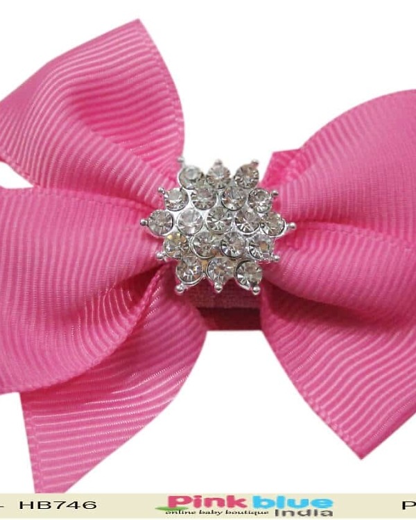 Pink infant headband with bow for birthday celebration, cute and comfy fit
