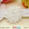 White net baby girl headband with big flower for wedding, elegant and adorable
