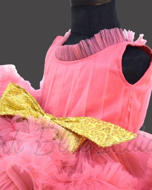 Girls peach layered ruffle gown with bow for birthday celebration stylish party dress