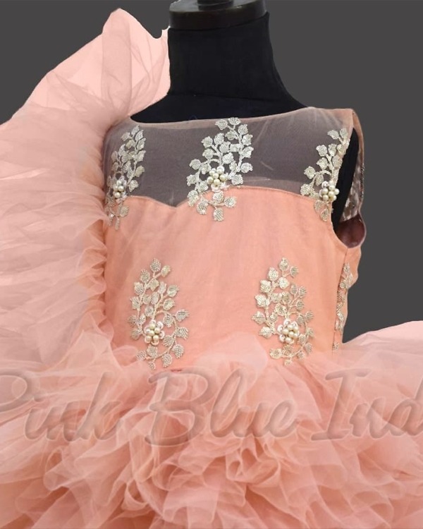 Stylish peach layered gown for girls birthday celebration soft elegant outfit