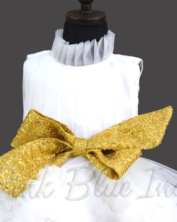 Beautiful White ruffle gown with bow for girls