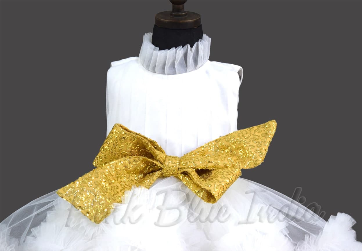 Beautiful White ruffle gown with bow for girls