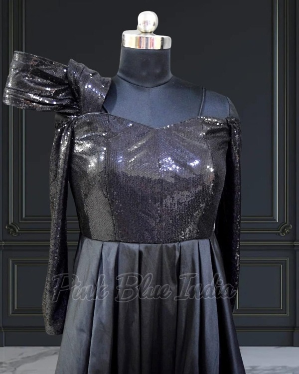 Coordinated black family outfits for wedding, stylish party wear, elegant look