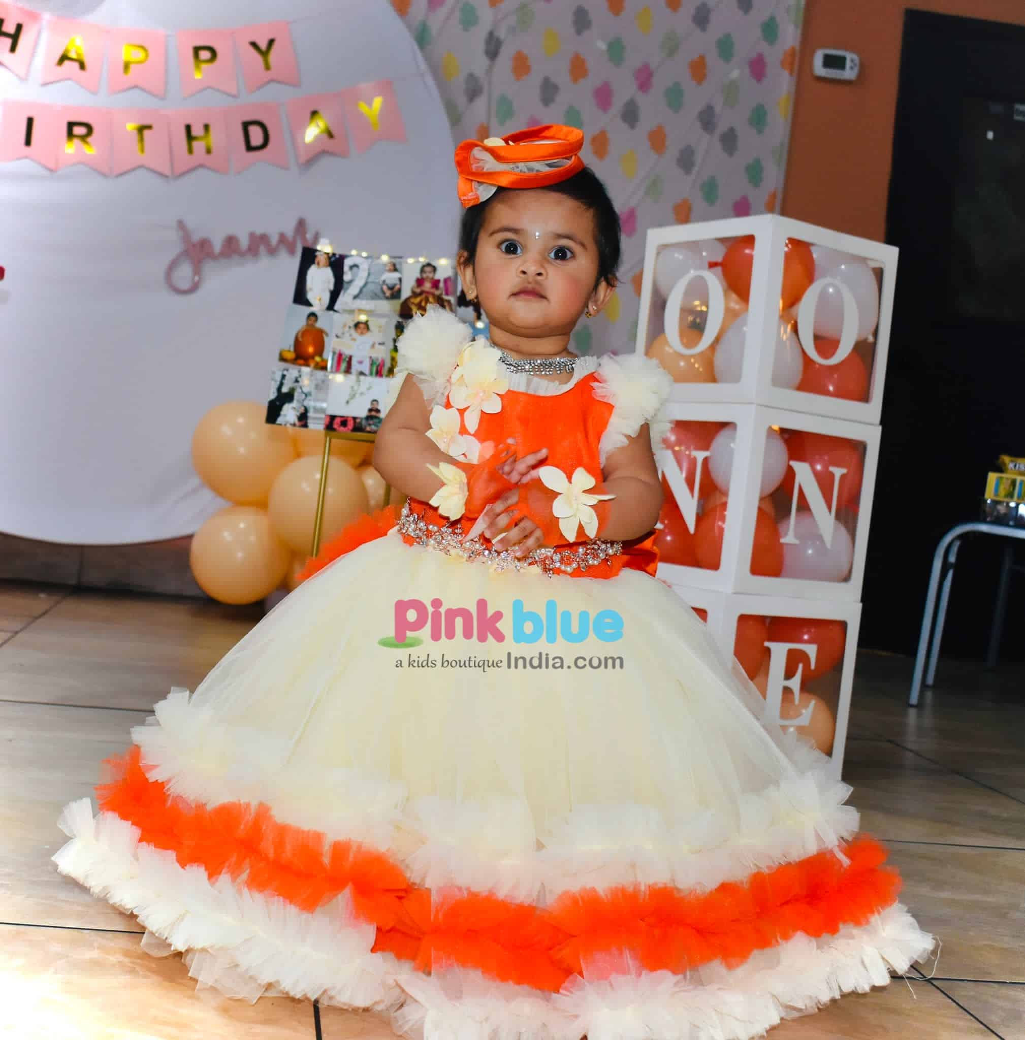 Long orange gown for girls birthday party with trail stylish outfit