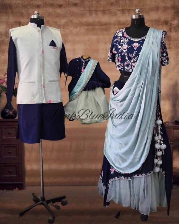 Family wedding matching ethnic outfits, cute mommy-daddy-baby style