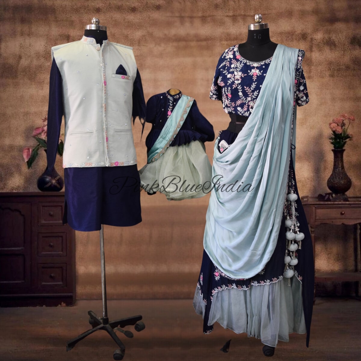 Family wedding matching ethnic outfits, cute mommy-daddy-baby style