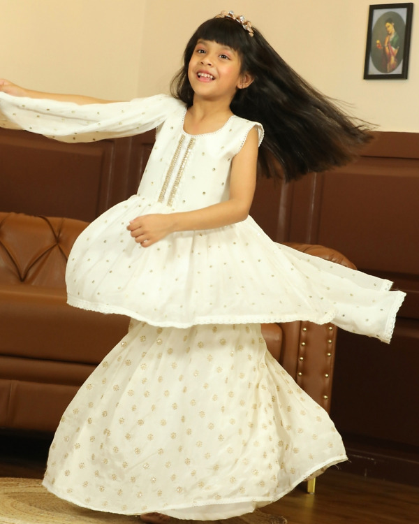 Girls White Peplum Sharara Set Ethnic Wear Pink Blue India model wearing